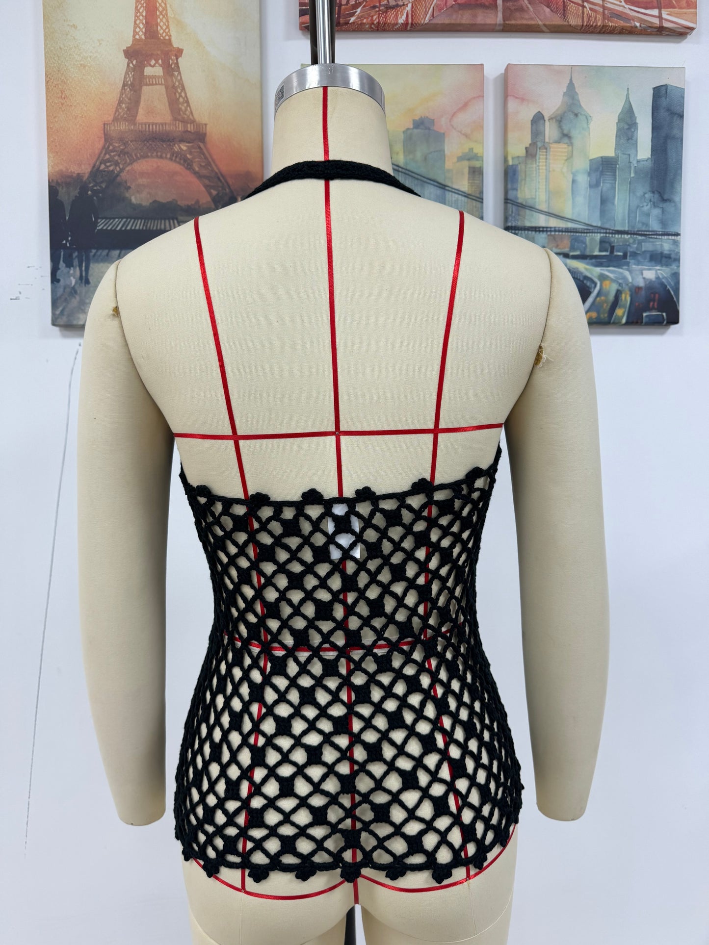 Blusa de punto con recortes para primavera y verano, ideal para vacaciones en la playa.