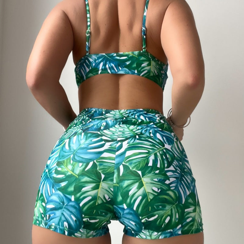 Traje de baño bikini con estampado de plantas tropicales