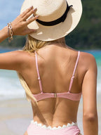 Top de bikini con aros y apliques con estampado de rayas de Bikinx