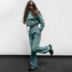 Ensemble automne-hiver femme : haut à manches longues, pantalon décontracté, fermeture éclair double poche et cordon de serrage, coloris uni.