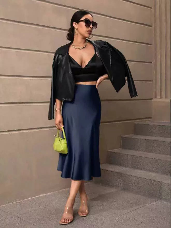 Jupe sirène en satin mi-longue à ourlet noué, collection automne femme. Direct
