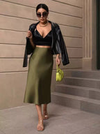 Jupe sirène en satin mi-longue à ourlet noué, collection automne femme. Direct