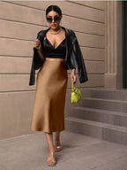 Jupe sirène en satin mi-longue à ourlet noué, collection automne femme. Direct
