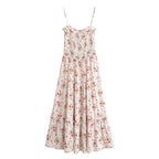 Robe midi d'été décontractée de plage, imprimée en rayonne, avec bretelles élastiques à la poitrine et taille cintrée.
