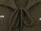 Gilet cardigan rétro à revers jacquard et lacets en maille, coupe ample et amincissante, idéal pour l'automne et les femmes.