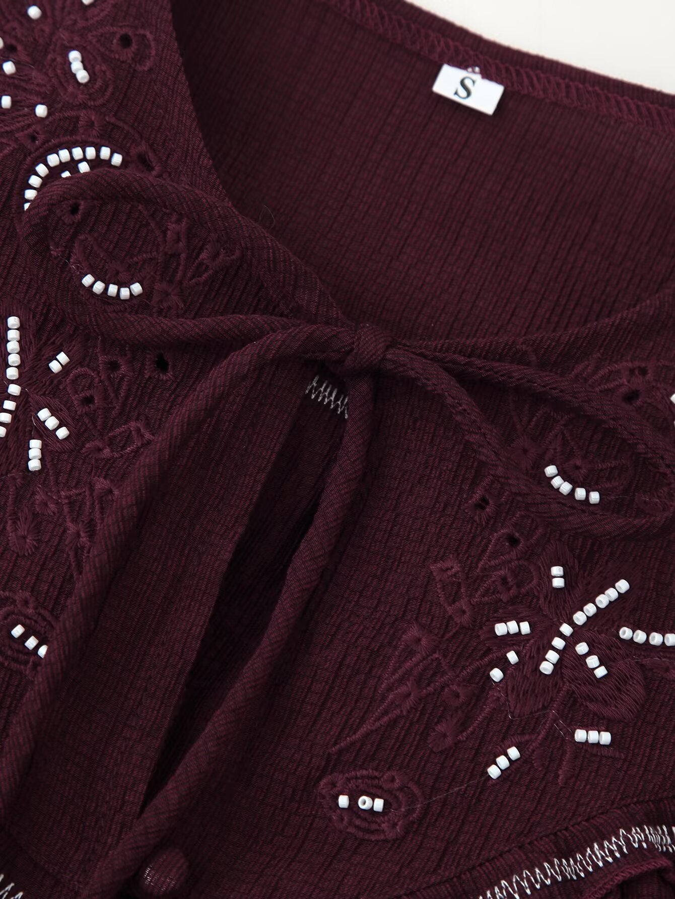 Chemise décontractée à manches longues pour femme, ornée de perles et de broderies.