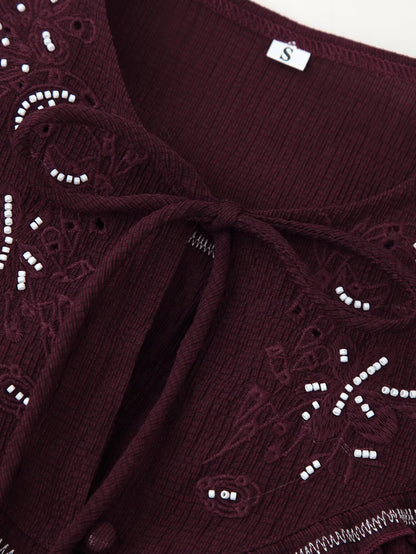 Chemise décontractée à manches longues pour femme, ornée de perles et de broderies.