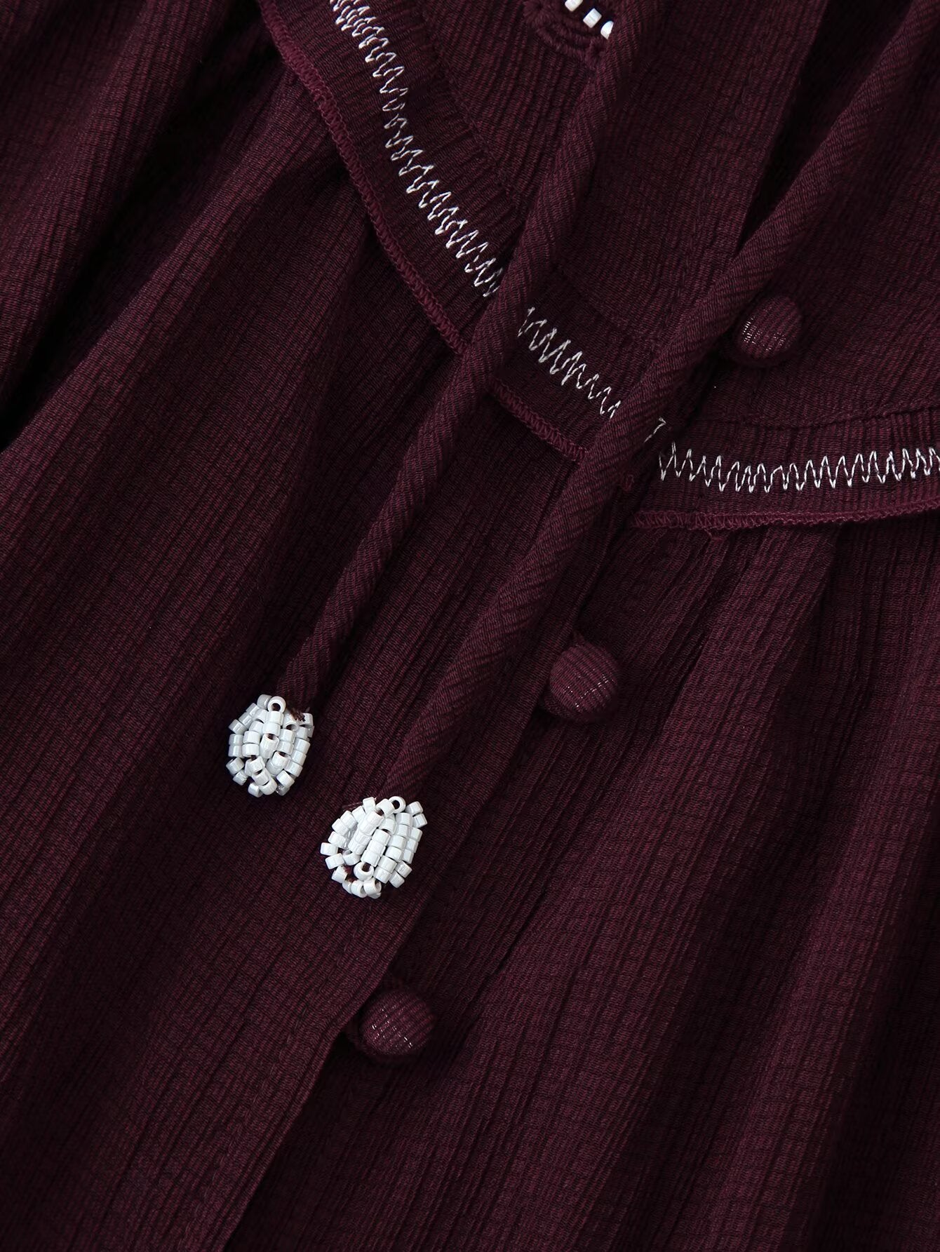 Chemise décontractée à manches longues pour femme, ornée de perles et de broderies.