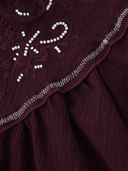 Chemise décontractée à manches longues pour femme, ornée de perles et de broderies.
