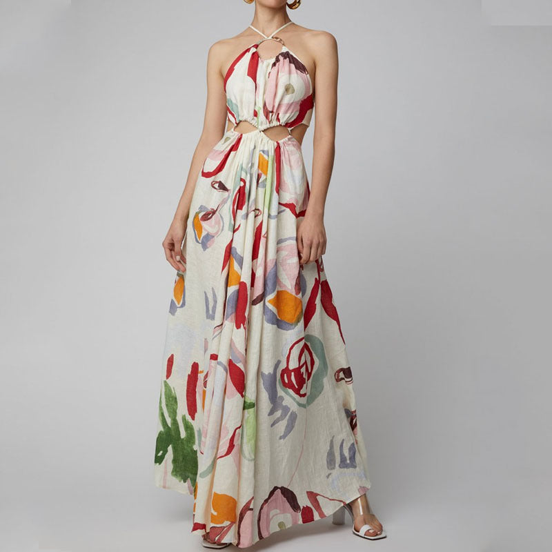 Robe longue imprimée à bretelles et coutures apparentes, coupe ajustée, idéale pour la plage, collection printemps-été femme.