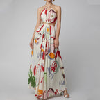 Robe longue imprimée à bretelles et coutures apparentes, coupe ajustée, idéale pour la plage, collection printemps-été femme.