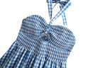 Vestido corto de primavera con cuadros, aberturas, espalda descubierta, tirantes y capas