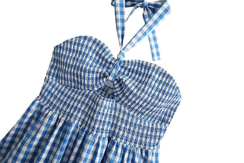 Vestido corto de primavera con cuadros, aberturas, espalda descubierta, tirantes y capas