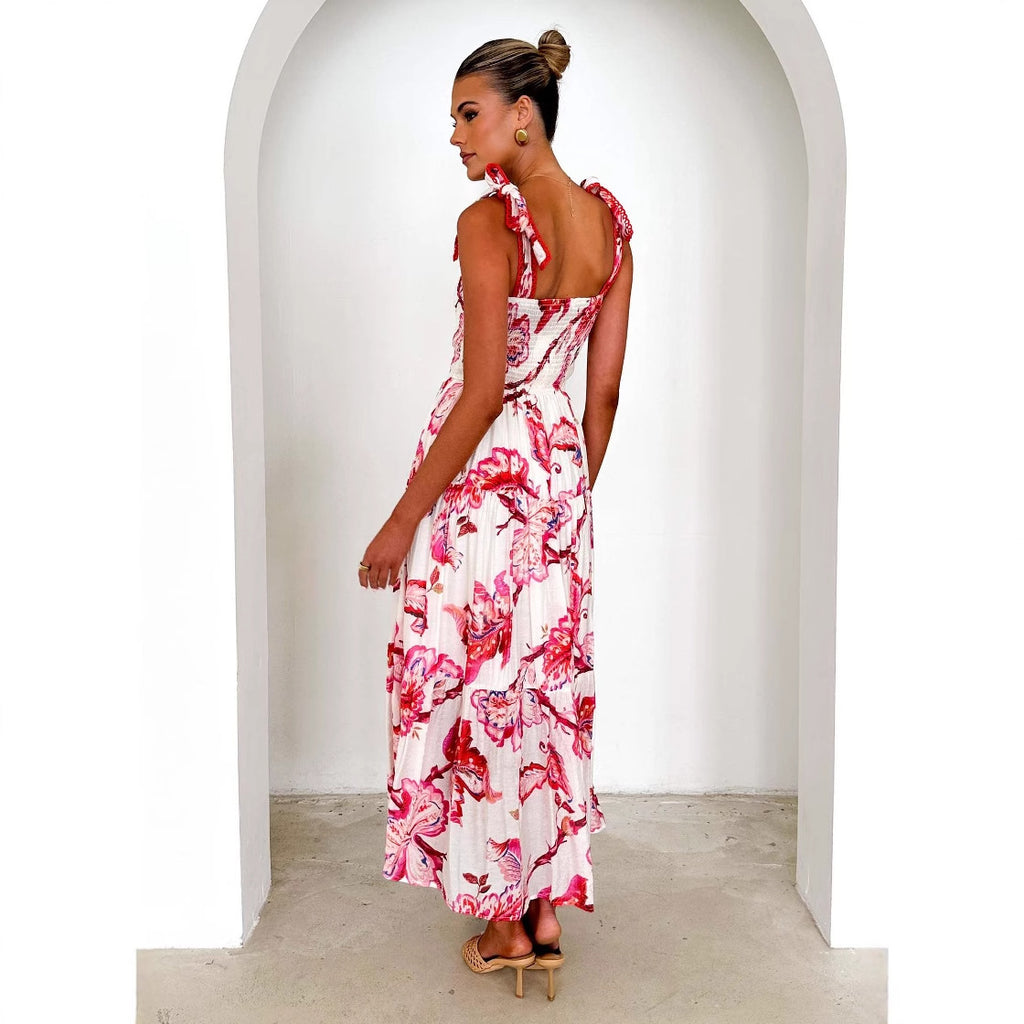 Robe longue ample à imprimé floral, style printemps-été, avec bretelles smockées et taille élastiquée.