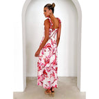 Robe longue ample à imprimé floral, style printemps-été, avec bretelles smockées et taille élastiquée.