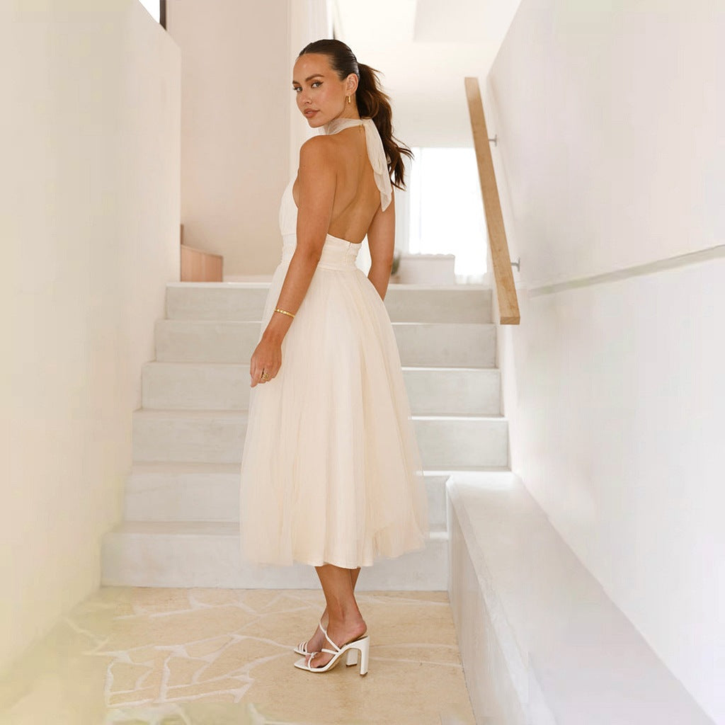 Vestido de primavera-verano con cuello alto, espalda descubierta y malla halter para mujer