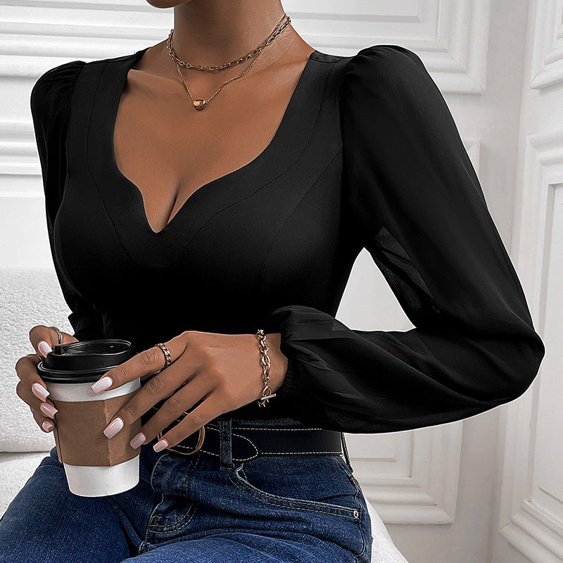 Mono negro con cuello en V y costuras de malla para mujer
