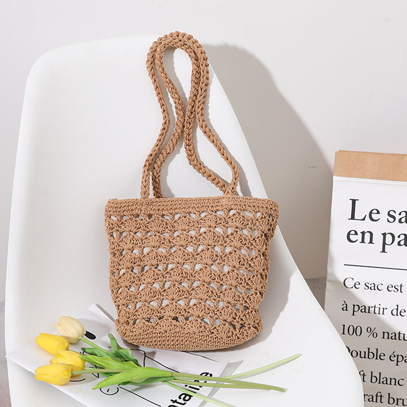 Bolso coreano de paja tejida a mano con hilo de algodón recortado y hueco, elegante bolso de un solo hombro, bolso portátil para playa y vacaciones en la playa. 