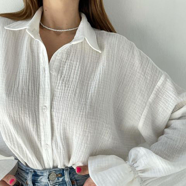 Chemise blanche décontractée à manches longues évasées pour femme, idéale pour l'automne.