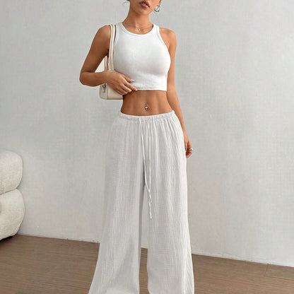Pantalones casuales de algodón puro, color sólido, holgados, de pierna ancha y con cola deshilachada