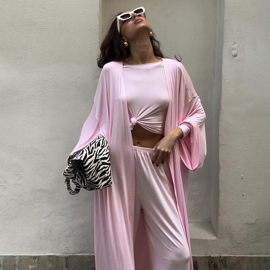 Pijama de verano de tres piezas de punto de color liso con parte superior y pantalones holgados y cómodos para usar en casa.