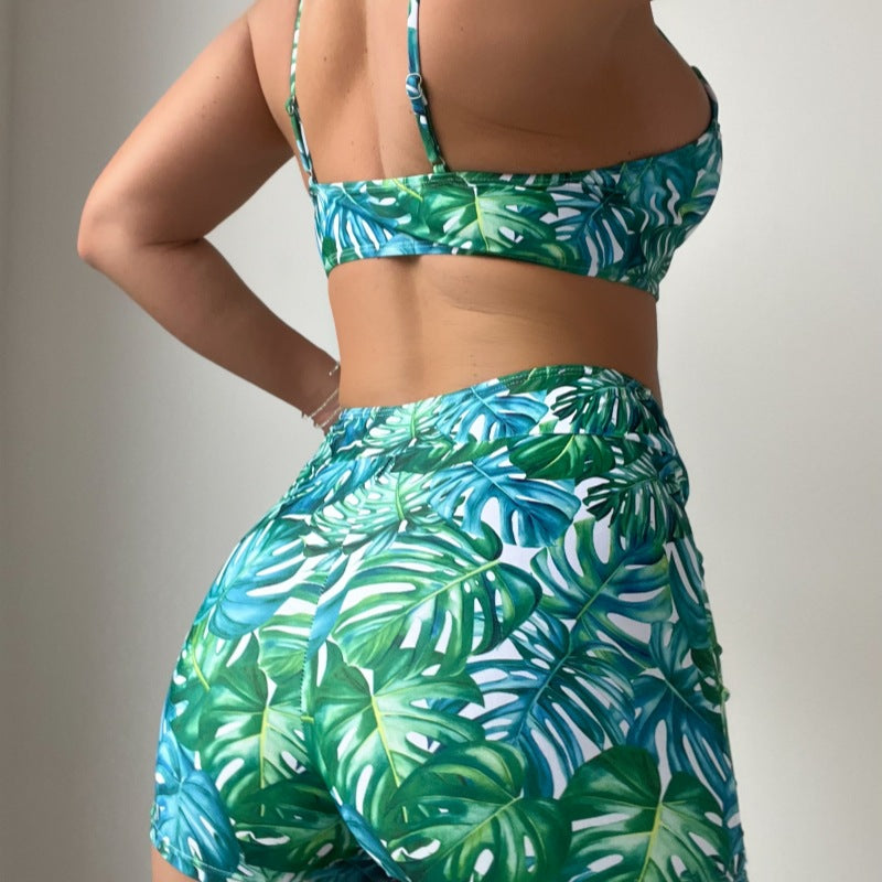 Traje de baño bikini con estampado de plantas tropicales