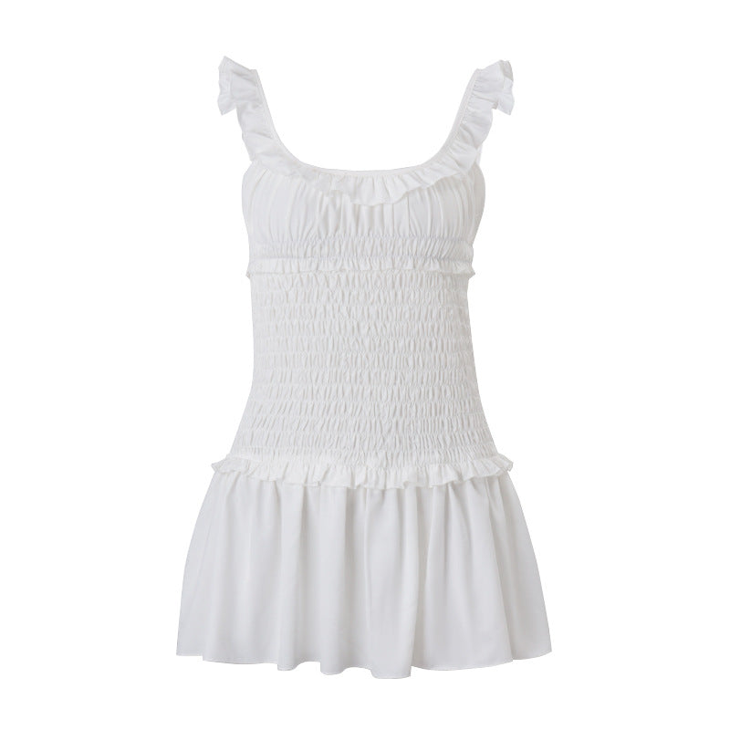Robe courte plissée à bretelles et oreilles en bois, sexy et élégante, pour femme. Collection printemps.