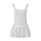 Robe courte plissée à bretelles et oreilles en bois, sexy et élégante, pour femme. Collection printemps.