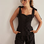 Conjunto de dos piezas de top bandeau negro con tirantes y cintura alta y pantalones anchos para primavera y verano
