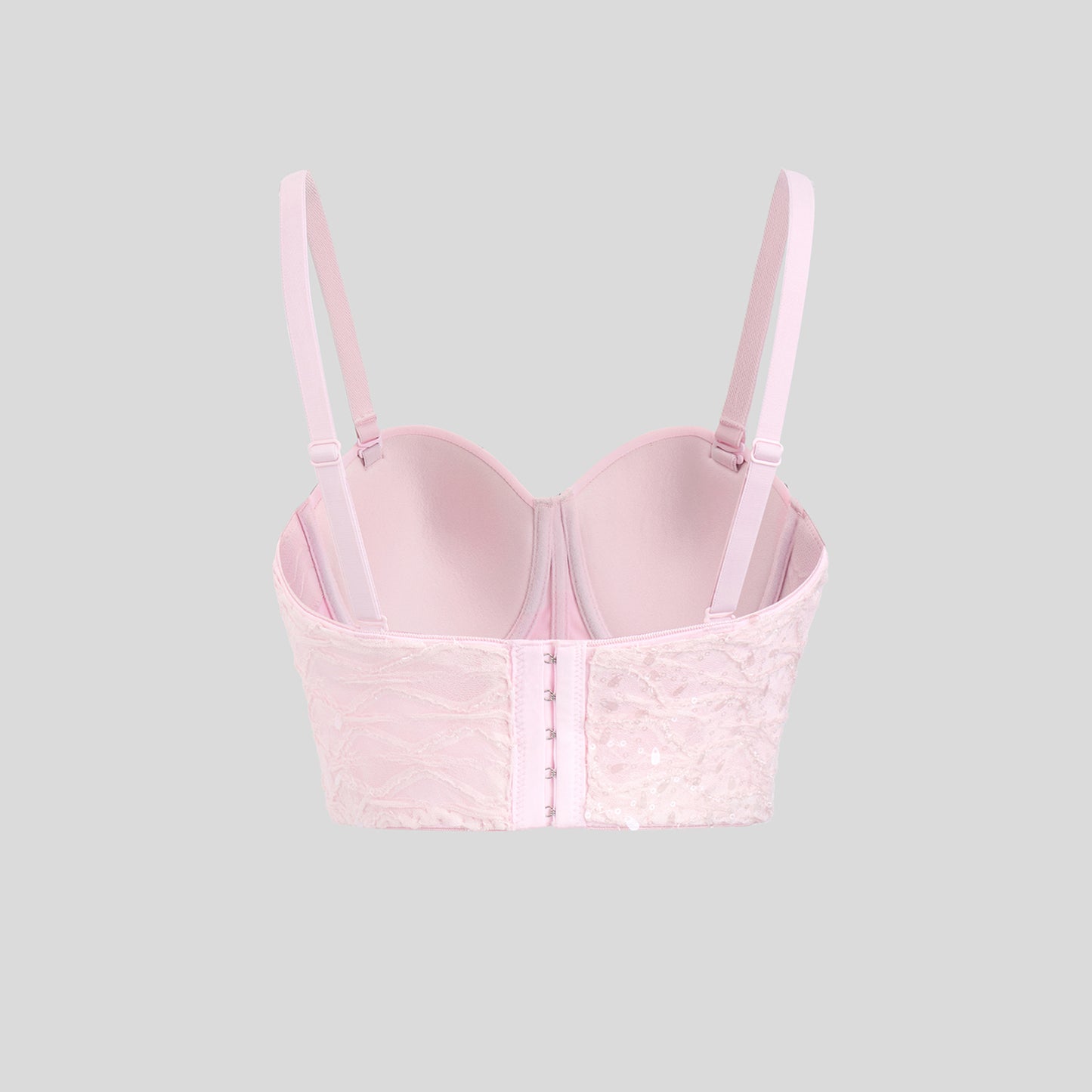 Haut bustier gainant à armatures, orné de strass floraux en relief et au design original tridimensionnel. Soutien-gorge à bretelles.