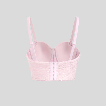 Haut bustier gainant à armatures, orné de strass floraux en relief et au design original tridimensionnel. Soutien-gorge à bretelles.