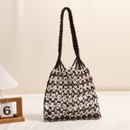 Sac de plage d'été en paille tressée avec lacets, idéal pour les vacances à la plage. 