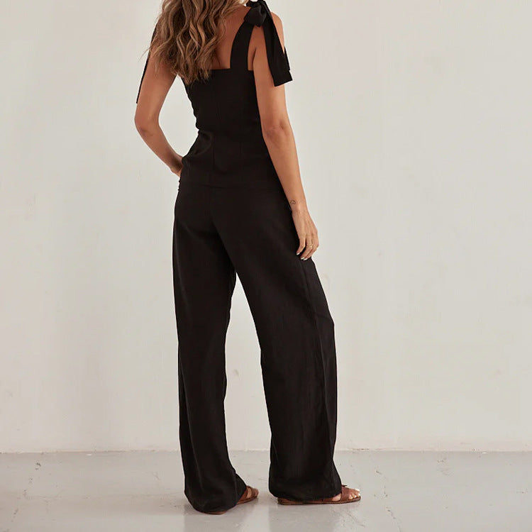 Conjunto de dos piezas de top bandeau negro con tirantes y cintura alta y pantalones anchos para primavera y verano
