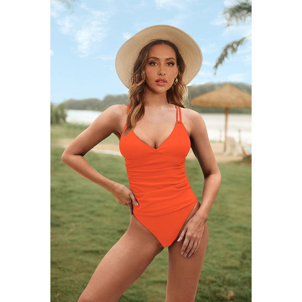 Traje de baño de dos piezas con escote en V y top peplum con tirantes cruzados