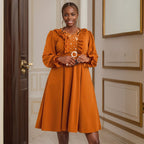 Robe de soirée à col V et manches lanternes pour femme, ornée de perles.