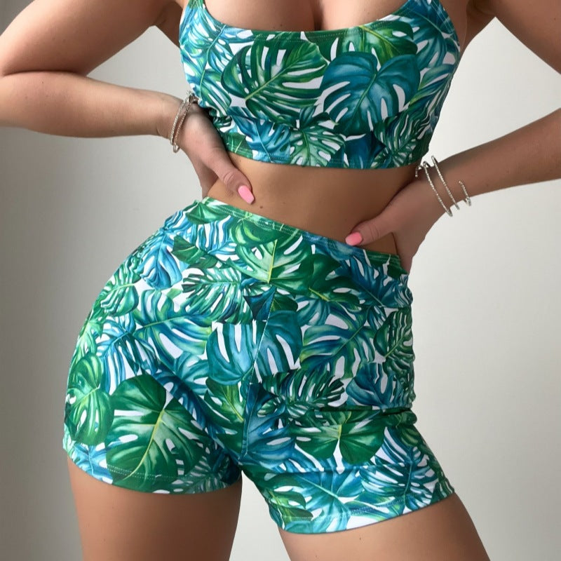 Traje de baño bikini con estampado de plantas tropicales