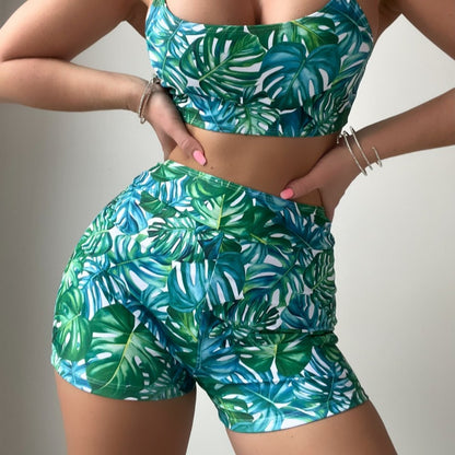 Traje de baño bikini con estampado de plantas tropicales
