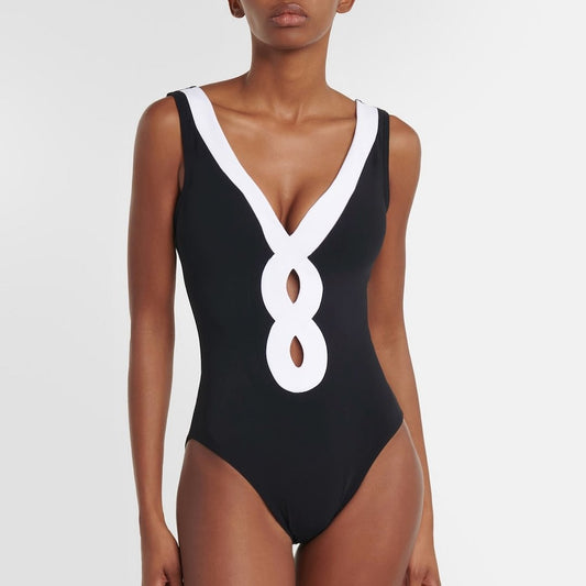 Conjunto de traje de baño con aberturas y falda para mujer, color blanco y negro