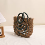 Bolso de paja portátil semicircular ahuecado con asa redonda y color contrastante para mujer, bolso de playa para vacaciones en la playa 