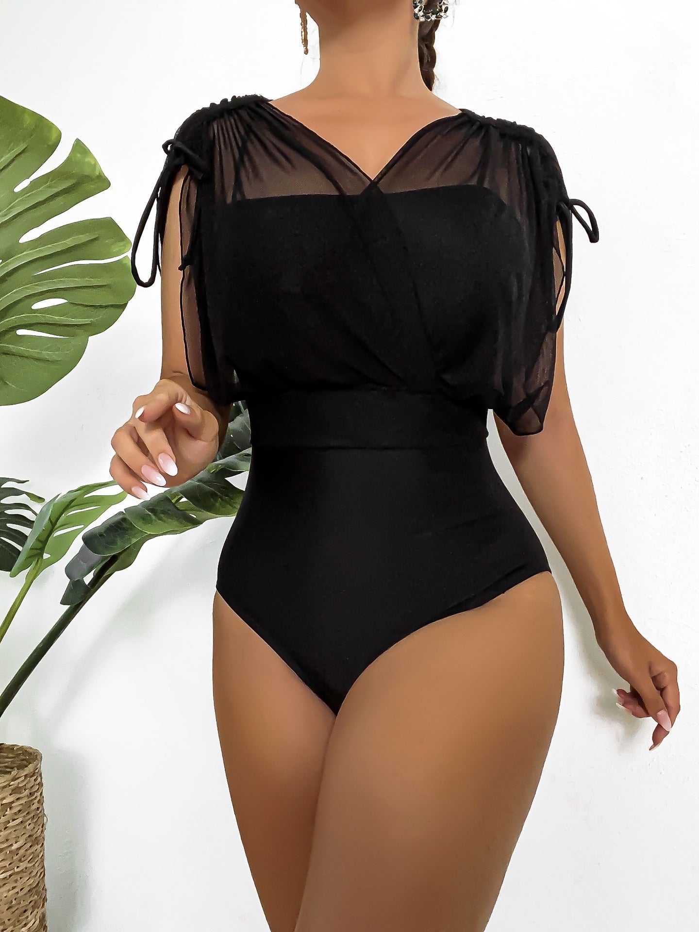 Top sexy de malla de cintura alta de una pieza de color sólido con cuello en V