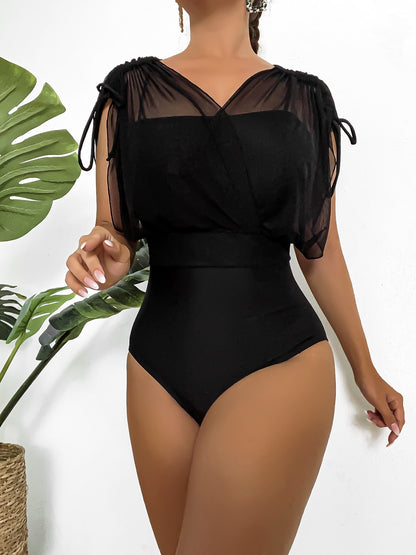 Top sexy de malla de cintura alta de una pieza de color sólido con cuello en V