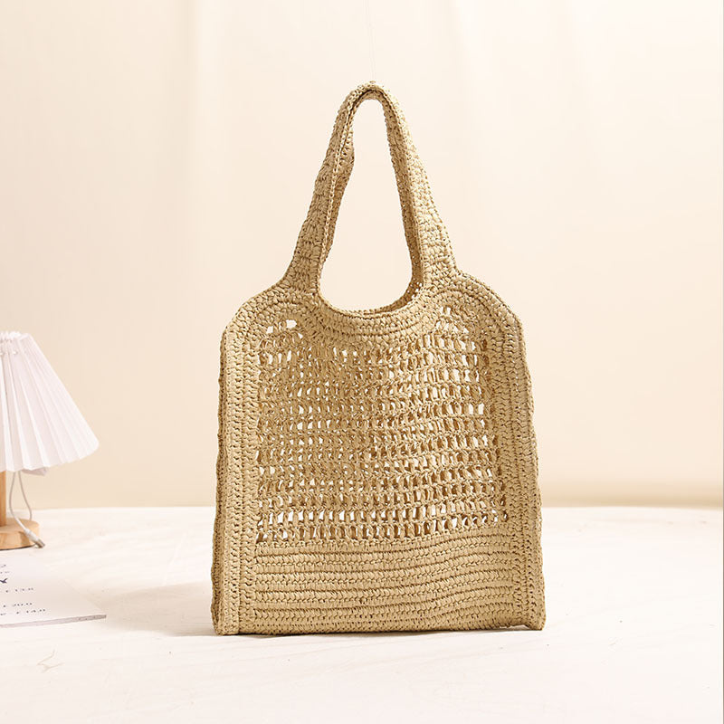 Bolso de paja tejido de verano con patrón de cordones, ideal para vacaciones en la playa. 