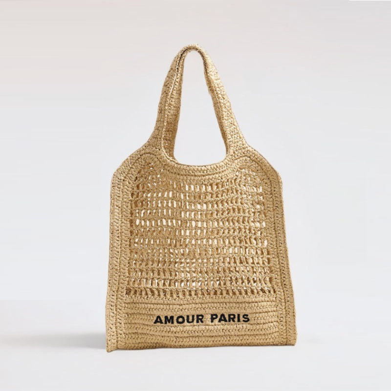Bolso de paja tejido de verano con patrón de cordones, ideal para vacaciones en la playa. 